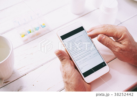 Patient filling online form out Patient filling online form out 38252442