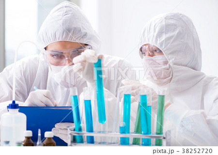 Two chemists working in the lab Two chemists working in the lab 38252720