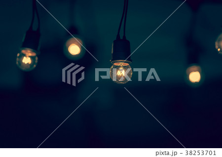 Retro light bulb hanging with space background 38253701