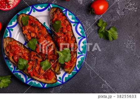 Baked eggplant with tomatoes, onion, garlic Baked eggplant with tomatoes, onion, garlic 38255633