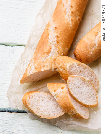 Hot french baguette at table Hot french baguette at table 38259371