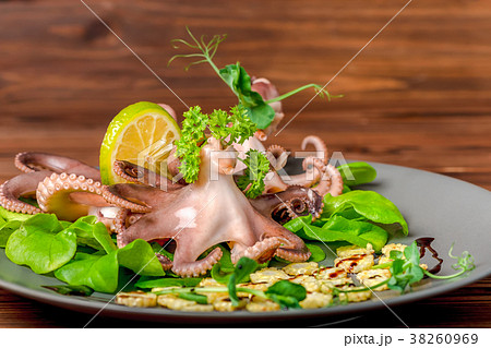 whole octopus served with lime, corn, cucumber whole octopus served with lime, corn, cucumber 38260969