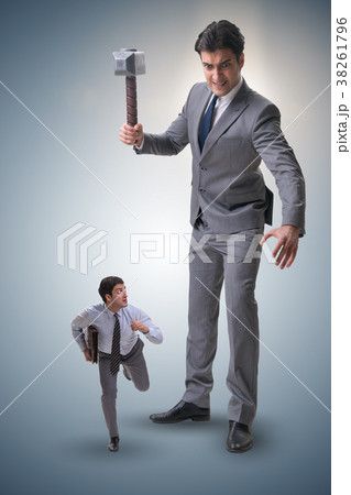 Bad angry boss threatening employee with hammer Bad angry boss threatening employee with hammer 38261796