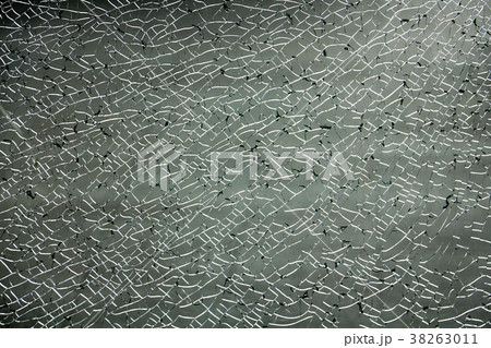Broken glass with dark tone. 38263011