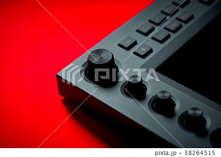 musical instrument, sampler on a red background musical instrument, sampler on a red background 38264515