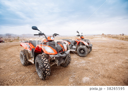 ATV Quad Bike in front of mountains landscape 38265595