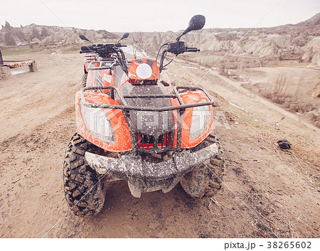 ATV Quad Bike in front of mountains landscape 38265602
