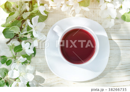 Mug of tea and apple blossom 38266735