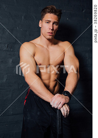 portrait of a young physically fit man workout at 38269820