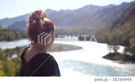 Young woman with red hair relaxation in the 38269949