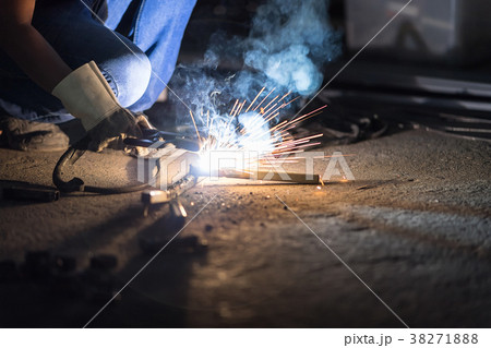 Welder Industrial automotive part in factory. Welder Industrial automotive part in factory. 38271888