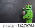 Green robot teacher ot the blackboard 38279768
