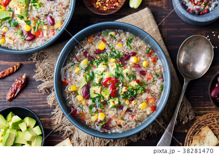 Vegetable quinoa soup with avocado, corn, beans. 38281470