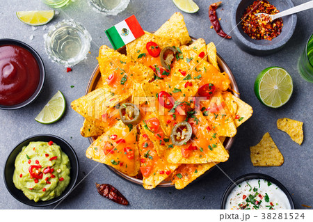 Nachos chips with Mexican flag and dips variety 38281524