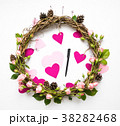 Festive wreath with roses, paper hearts. Flat lay 38282468