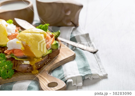 Eggs benedict with salmon background 38283090