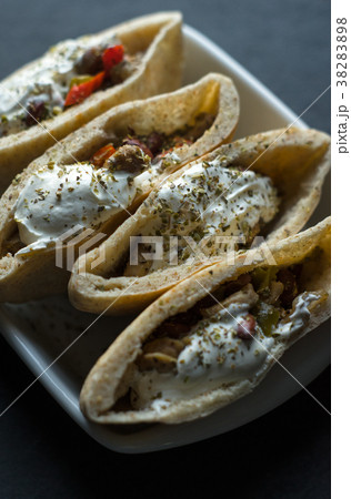 Tortilla stuffed with chicken and vegetables with 38283898