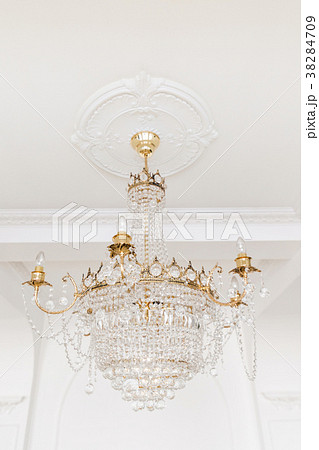 Expensive interior. Large electric chandelier made Expensive interior. Large electric chandelier made 38284709