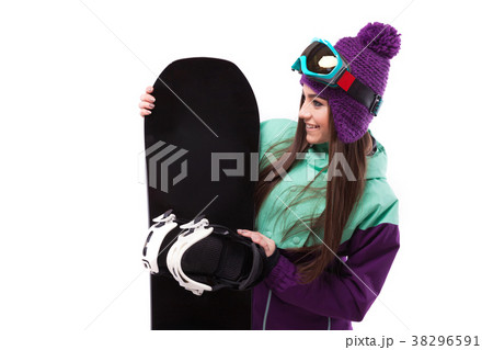 young beautiful woman in purple ski coat and young beautiful woman in purple ski coat and 38296591