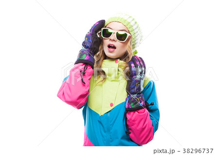 young woman in ski suit and sunglasses 38296737
