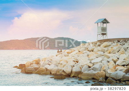 White safe guard stand over seacoast skyline White safe guard stand over seacoast skyline 38297820