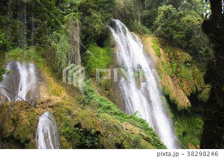 Waterfall water jets fall from a height between 38298246