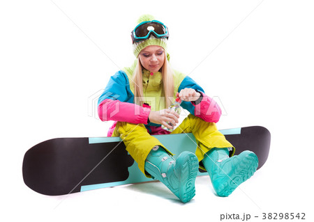 attractive young woman in ski suit and ski glasses 38298542