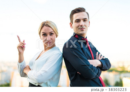 Couple of businessmen, good looking brunette man 38303223