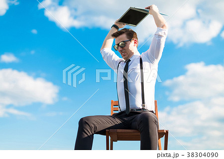 Attractive serious busunessman in white shirt, tie 38304090
