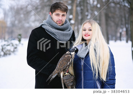 Young couple with a falcon Young couple with a falcon 38304653
