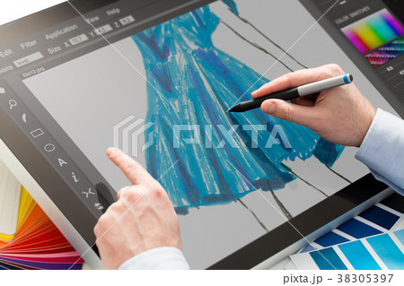 Graphic designer at work. Color samples. 38305397