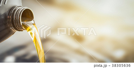 Motor oil pouring. Motor oil pouring. 38305636