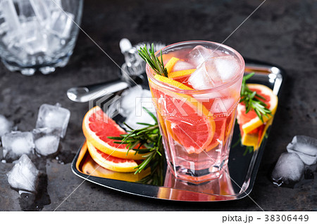 Grapefruit and fresh rosemary gin cocktail 38306449