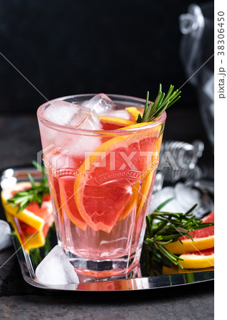 Grapefruit and fresh rosemary gin cocktail 38306450