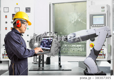 Automotive engineer working with robot industry Automotive engineer working with robot industry 38307305