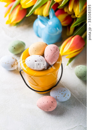 Easter composition with quail eggs and tulips 38308395