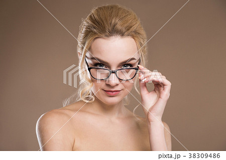 girl in glasses from the front 38309486