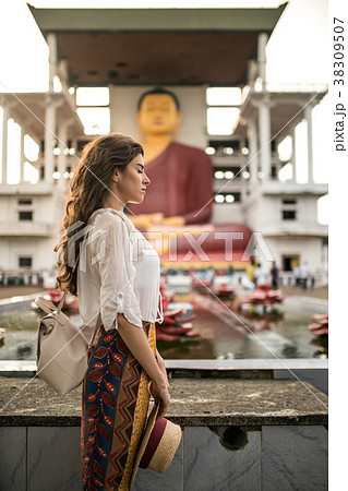 Girl in buddhist temple 38309507