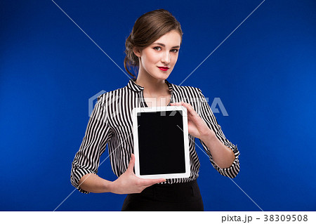 girl with a tablet in hands 38309508