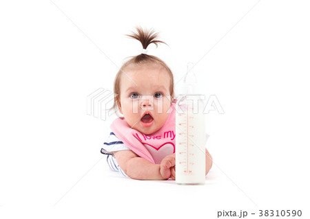 cute confused baby girl in white shirt and pink 38310590