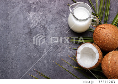 Coconut shell and milk Coconut shell and milk 38311263