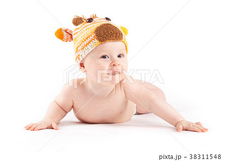 cutie little boy in white diaper and deer hat 38311548