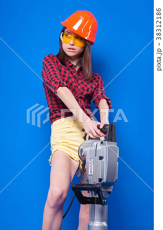 Pretty slim sexy builder girl in red chechered Pretty slim sexy builder girl in red chechered 38312186