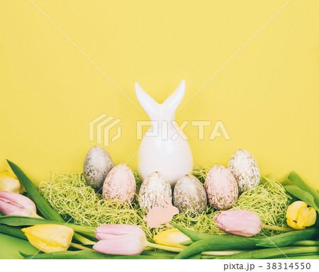 Easter composition with painted eggs and easter Easter composition with painted eggs and easter 38314550