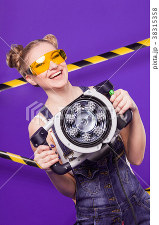 Beauty young builder girl in denim jumpsuit and Beauty young builder girl in denim jumpsuit and 38315358