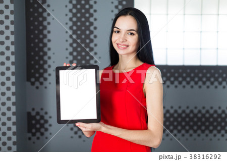 Attractive businesslady in red dress show empty 38316292