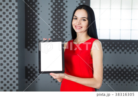 Attractive businesslady in red dress show empty Attractive businesslady in red dress show empty 38316305
