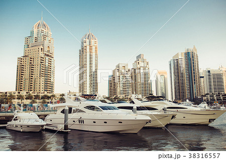 Luxury yachts parked on the pier 38316557