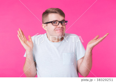 Doubtful caucasian man with gestures in Doubtful caucasian man with gestures in 38320251