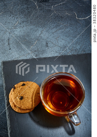 Shallow depth of field photo of a glass cup of 38320480